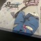 La "pubica" copertina scartata di Senran Kagura Burst in Europa