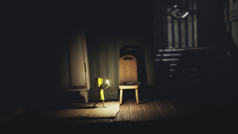 Little Nightmares Six explores the scene with the help of a flashlight