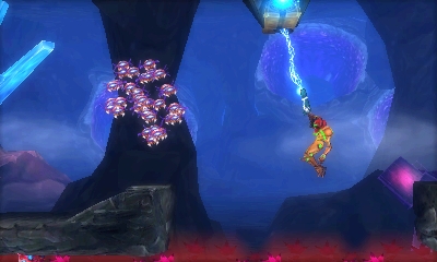 Metroid: Samus Returns: Samus utilizza il Grapple Beam.