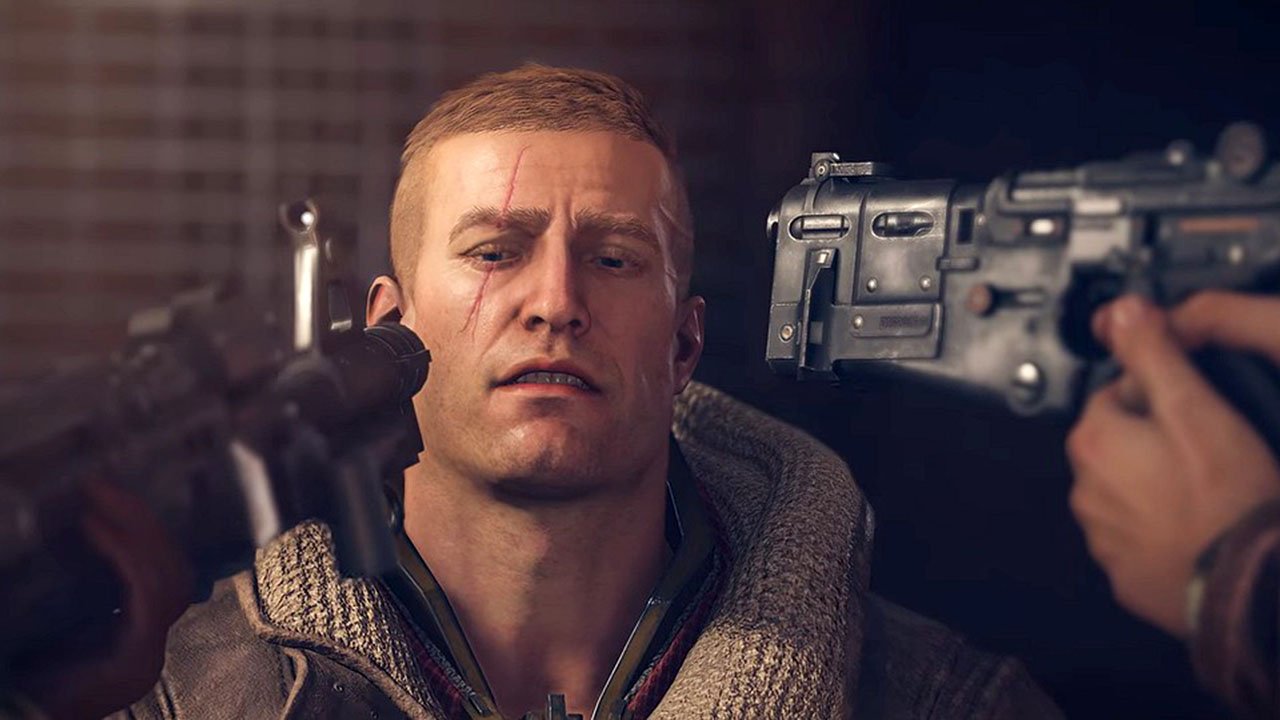 B.J di Wolfenstein con delle armi puntate al volto