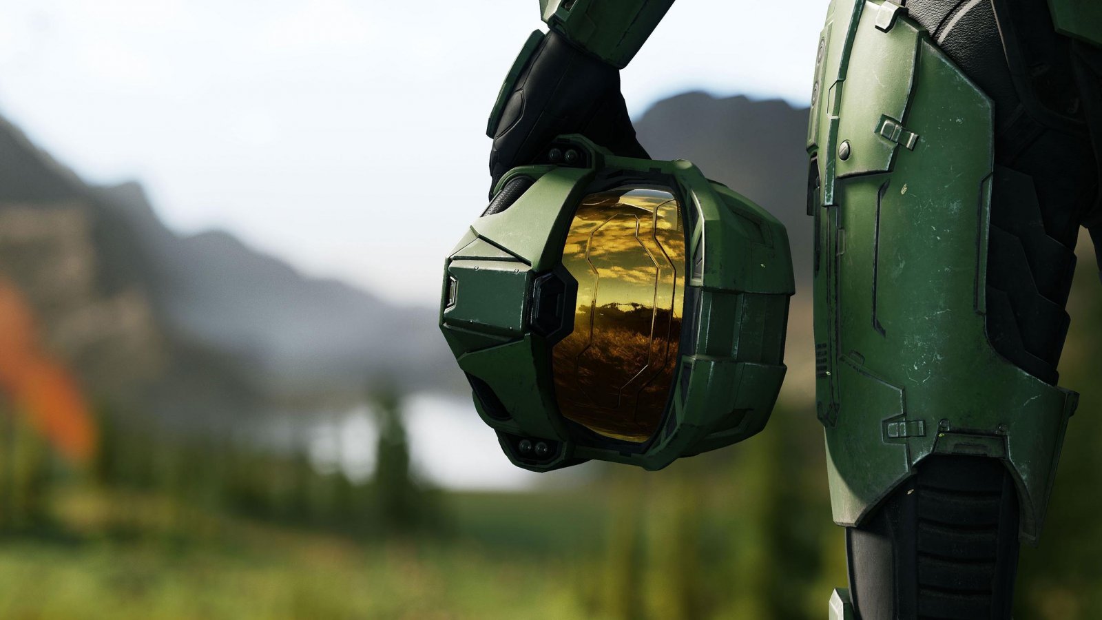 Master Chief in Halo Infinite col casco in mano