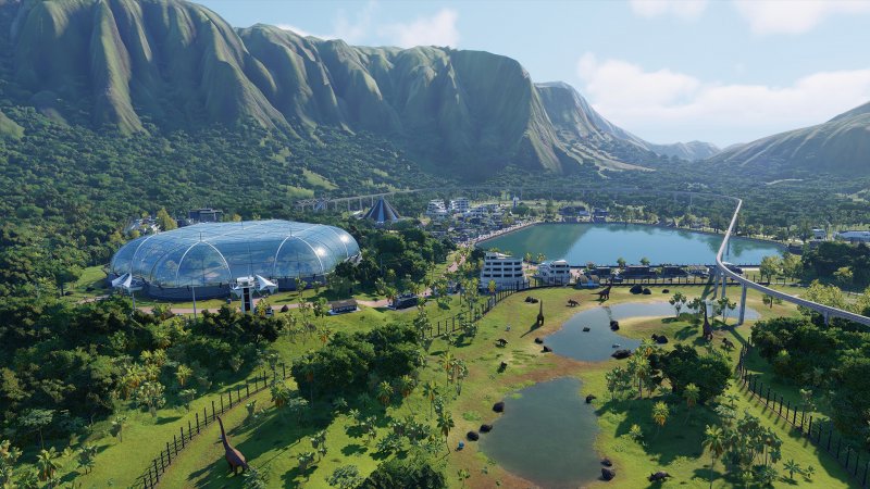 Una panoramica dall'alto di un parco di Jurassic World Evolution 2