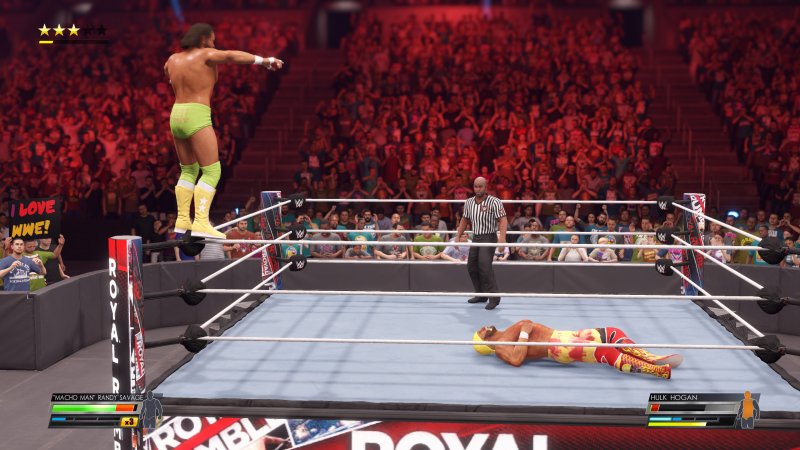 WWE 2K22, "Macho Man" Randy Savage sta per eseguire la sua iconica elbow drop su Hulk Hogan WWE 2K22, "Macho Man" Randy Savage sta per eseguire la sua iconica elbow drop su Hulk Hogan
