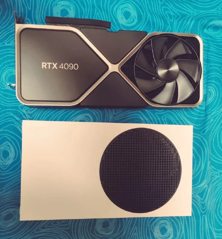 Le dimensioni delle GeForce RTX 4090 confrontate a quelle di Xbox Series S Le dimensioni delle GeForce RTX 4090 confrontate a quelle di Xbox Series S