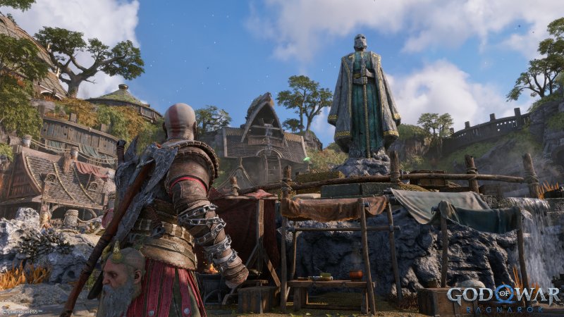 Kratos guarda una statua di Odino Kratos guarda una statua di Odino