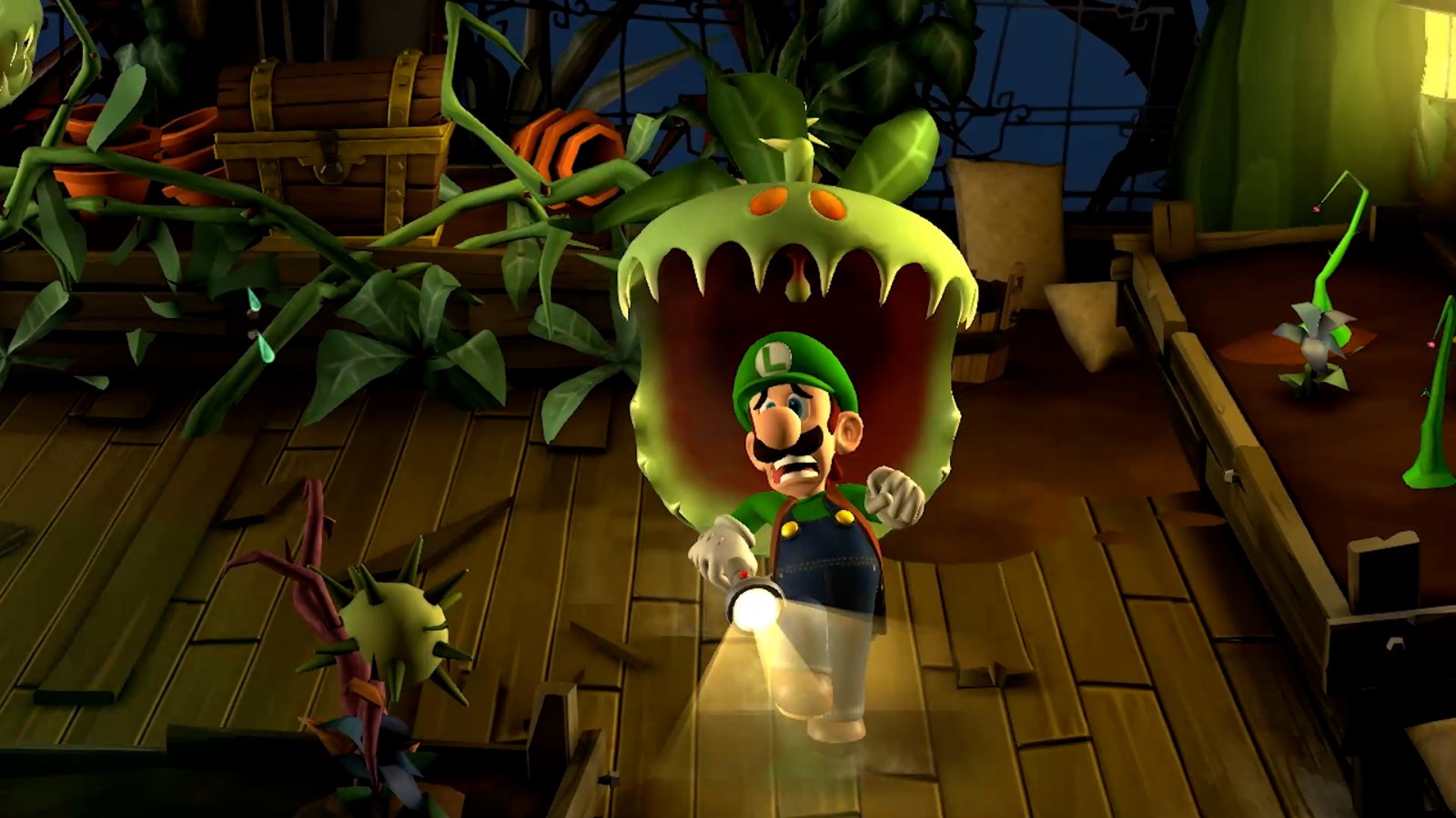 Luigi alle prese con una pianta carnivora in Luigi's Mansion 2 HD