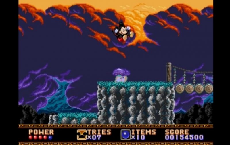 Topolino attacca un fungo col suo topesco culetto in Castle of Illusion Topolino attacca un fungo col suo topesco culetto in Castle of Illusion