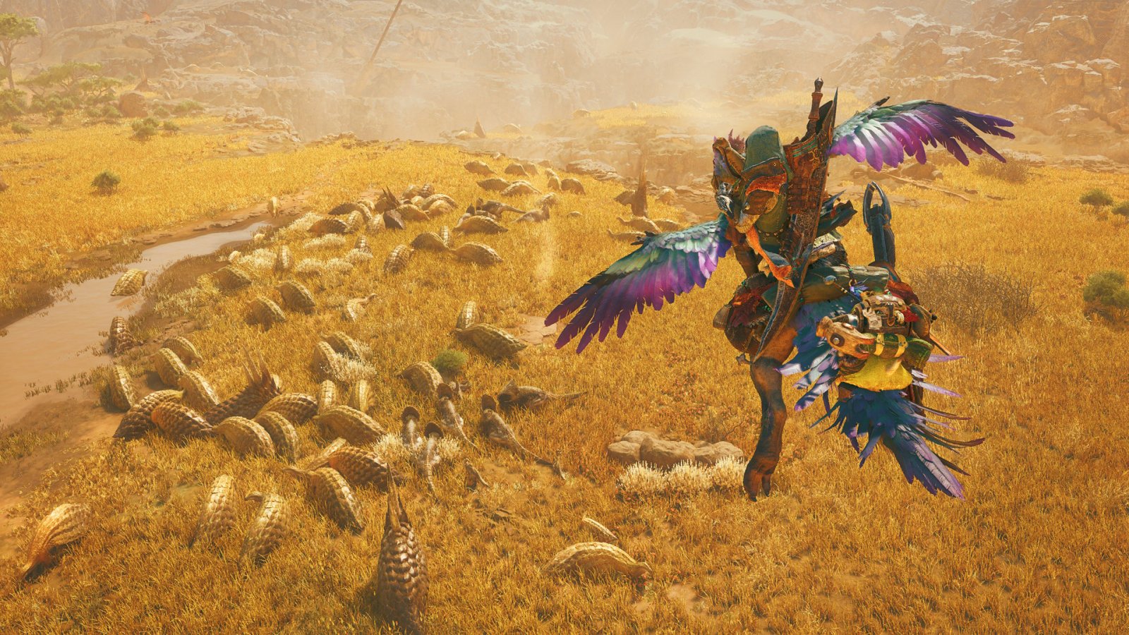 Un cacciatore di Monster Hunter Wilds che plana verso una mandria in una prateria