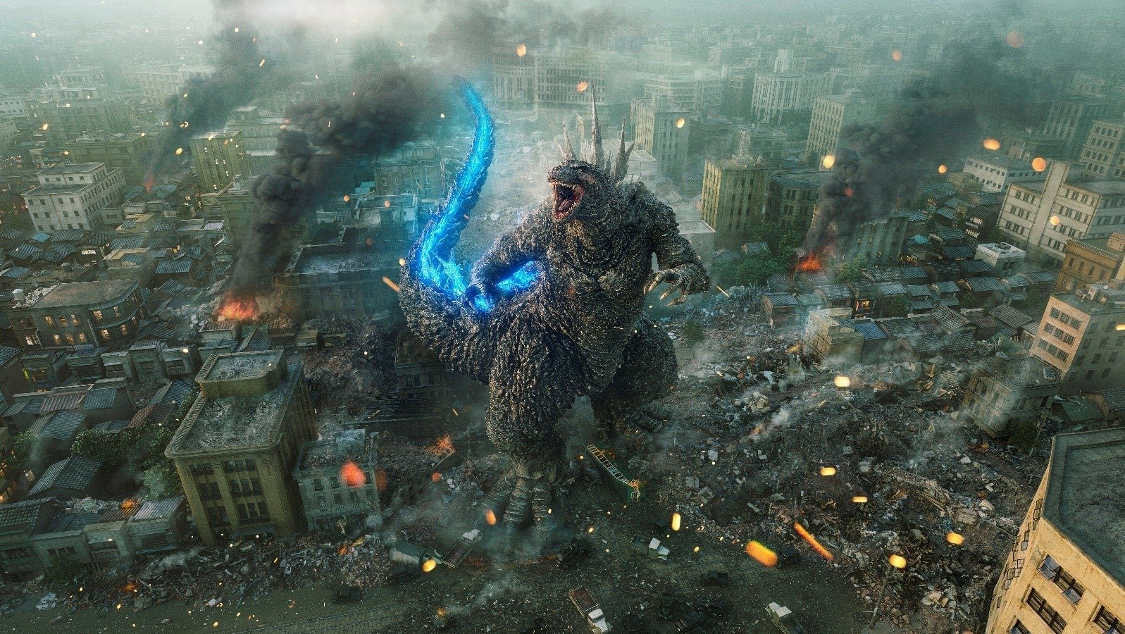 Godzilla nel mezzo di una città distrutta