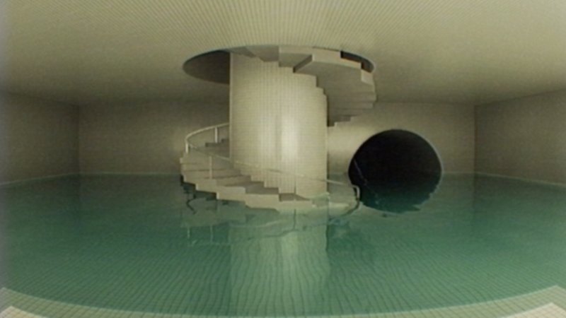 Una scala a chiocciola in Dreamcore: tutto sembra così tranquillo, ma chi ha il coraggio di entrare lì dentro?