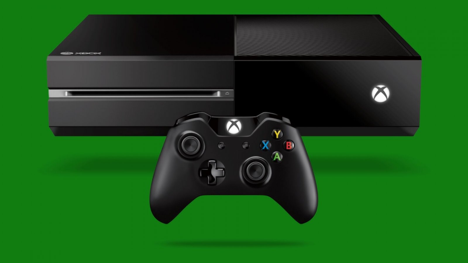 Xbox One e il suo controller di colore nero su sfondo verde