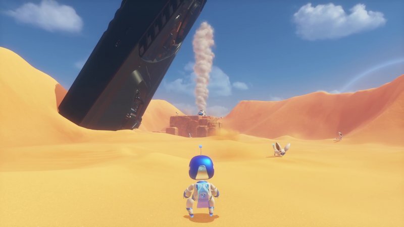 Astro Bot in un deserto, all'inizio del proprio viaggio Astro Bot in un deserto, all'inizio del proprio viaggio