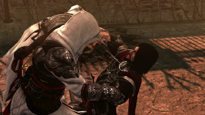 Ezio in procinto di porre fine alla vile esistenza di Cesare Borgia