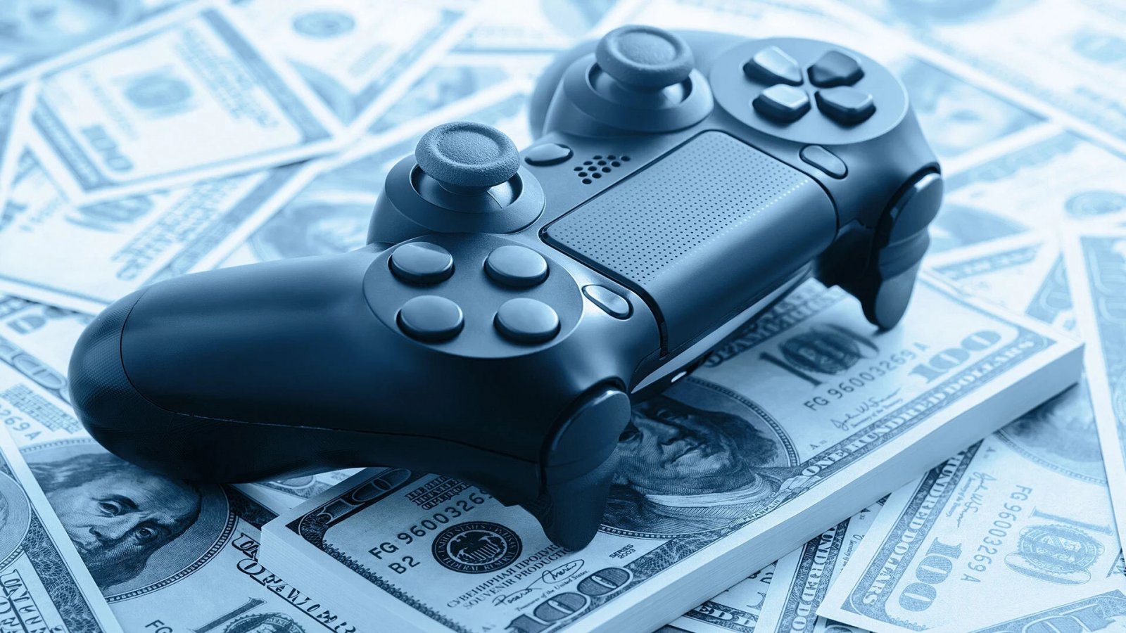 un controller dualshock 4 sopra dei dollari