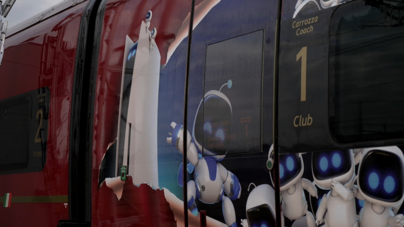 Astro Bot sui trani Italo
