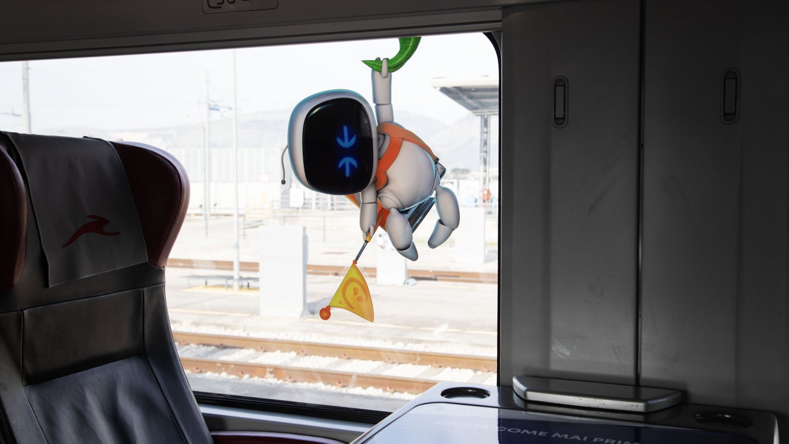 Astro Bot in un treno
