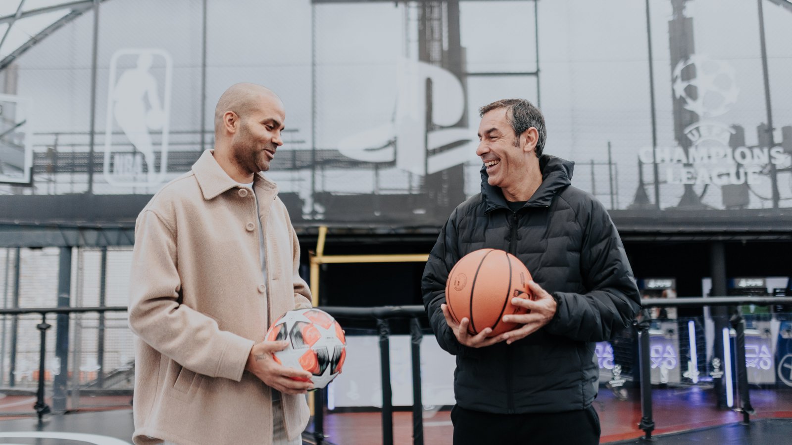 Tony Parker (left) and Robert Pires (right) at the PlayStation Crossover Concept Court event in Paris 2