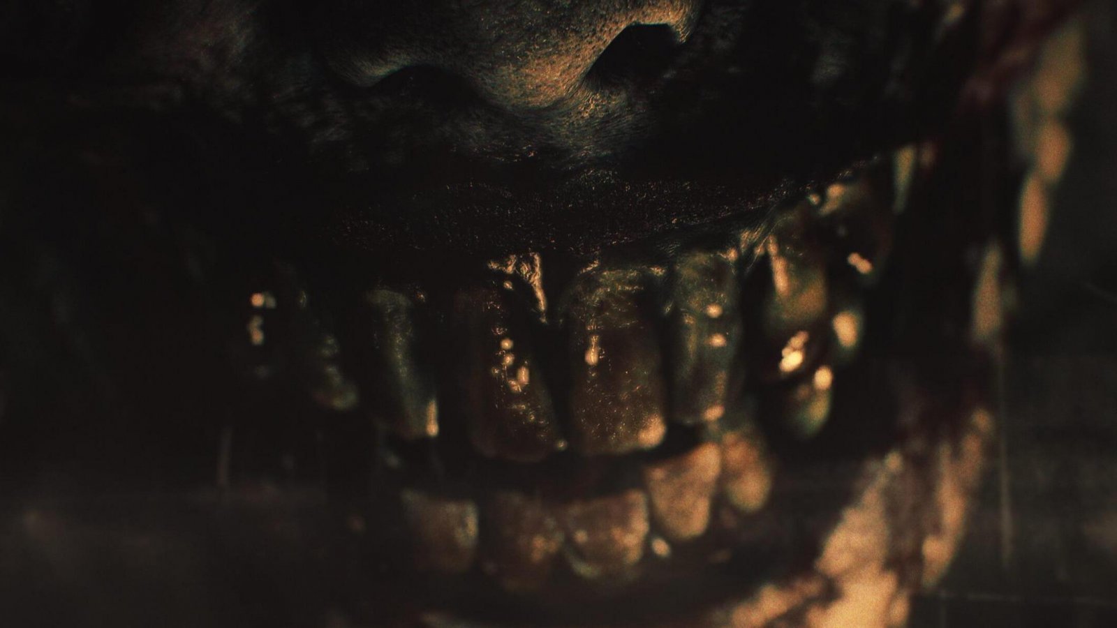 Un sorriso con denti marci di un mostro di Resident Evil Requiem