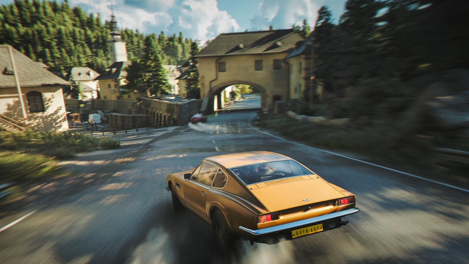 Un'auto gialla di 007: First Light che derapa in una strada svizzera