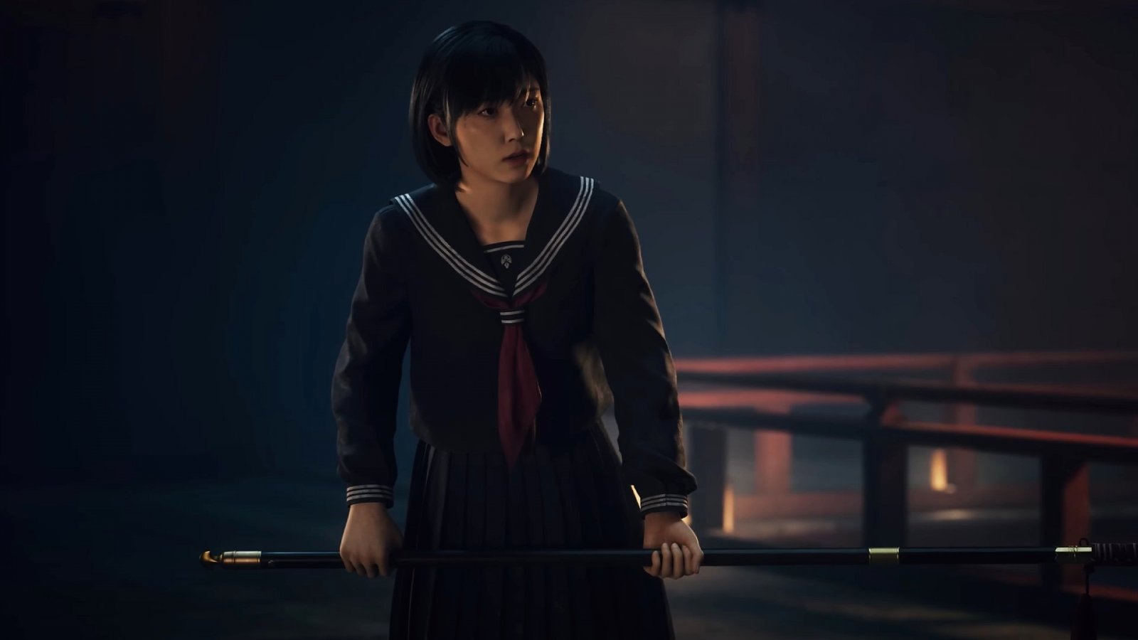 La protagonista di Silent Hill f con un'arma in pugno