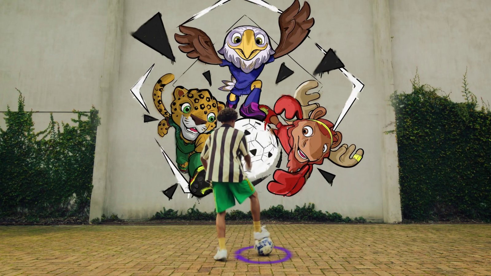 Un giocatore di FIFA Heroes con tre mascotte