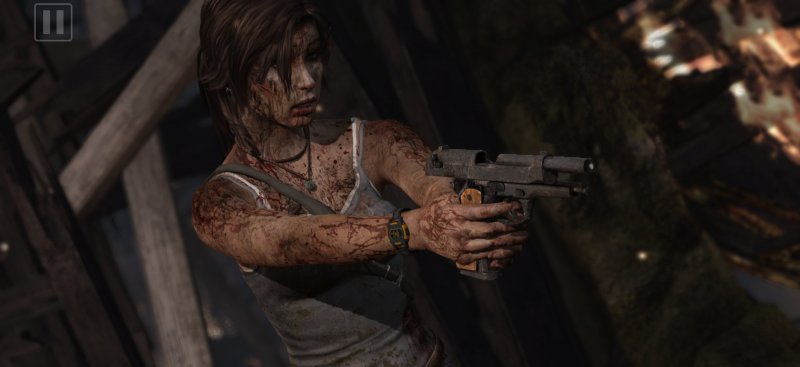 Lara impugna la pistola dopo un episodio traumatico in Tomb Raider