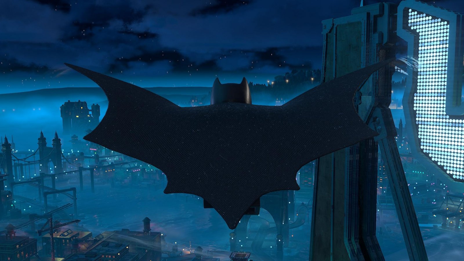 Batman con il mantello aperto
