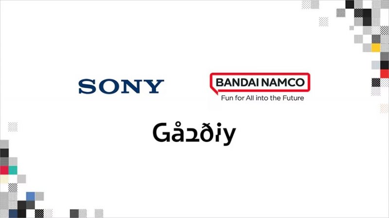 La grafica usata per la collaborazione tra Sony, Bandai Namco e Gaudiy